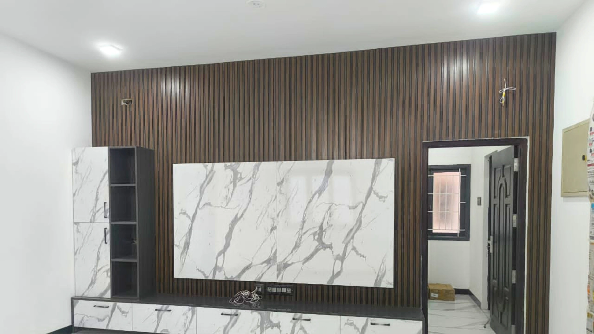 home-living-room-tv-unit-interior-in-chennai-done-by-eps-interior-industries